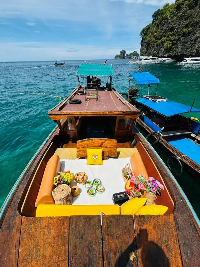 Luxury longtail moored near an island