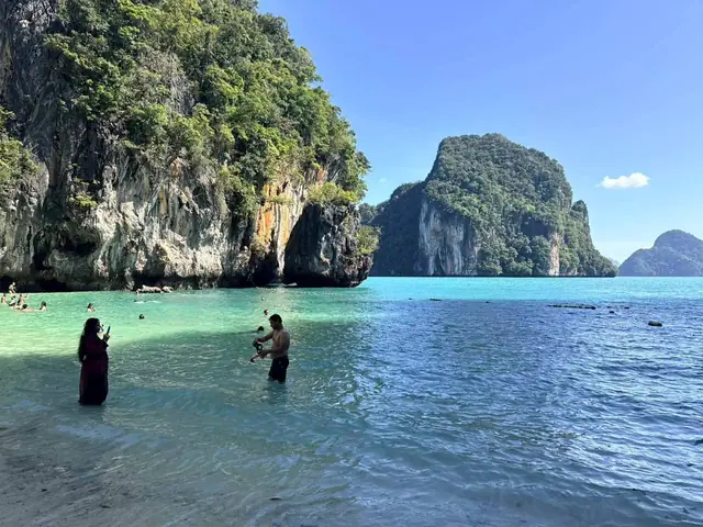Clear water under the limestone cliffs, Hong Islands