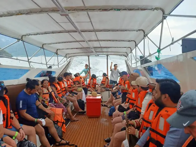 Inside the speedboat with a full group of travellers