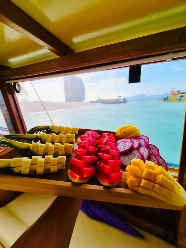 Cut fruit platter in the cabin with a sea view