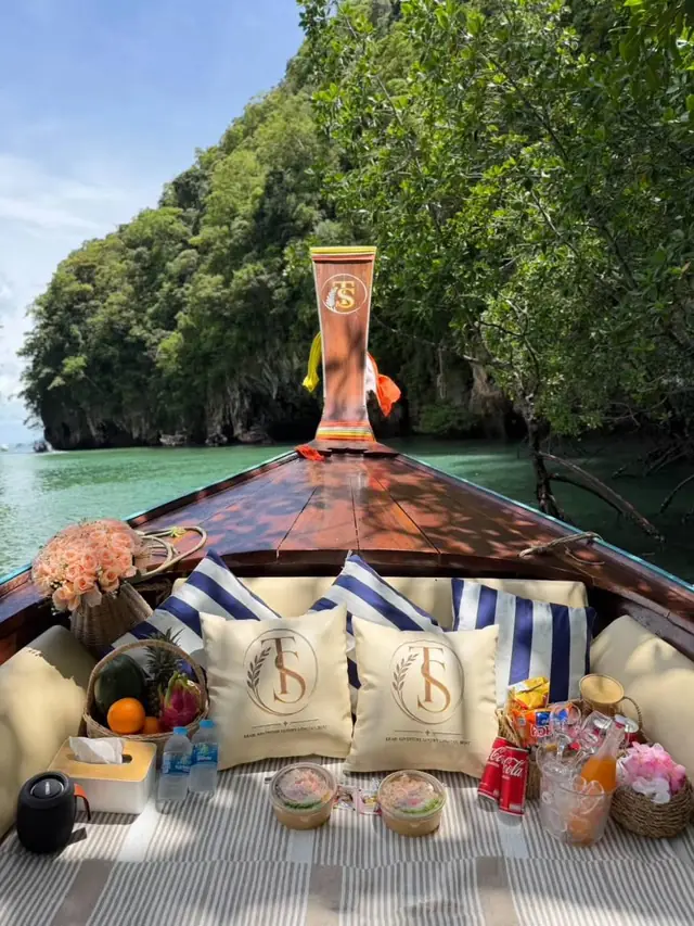 Luxury longtail bow with logo cushions beside an island