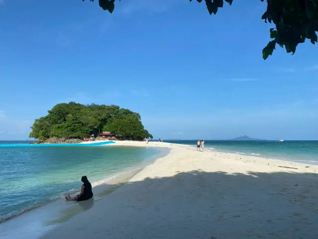 The Talay Waek sandbar running out to the island