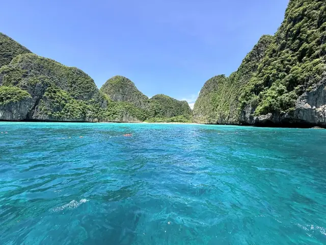 Clear bay ringed by cliffs, Phi Phi Islands