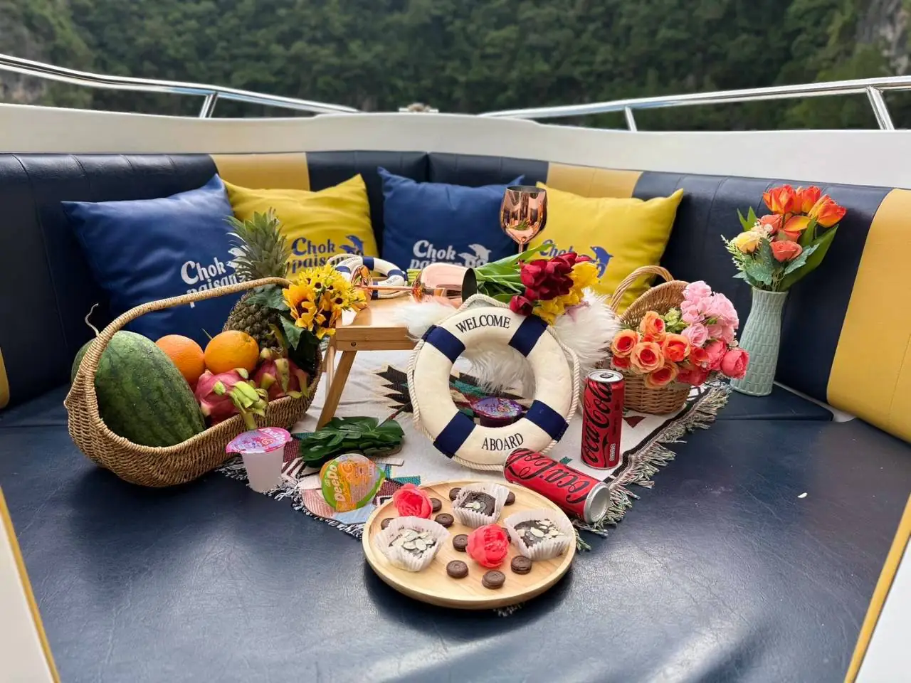 Luxury speedboat stern set with fruit, flowers and cushions