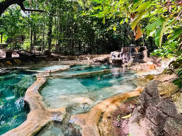 Rock terraces and clear pools in the forest